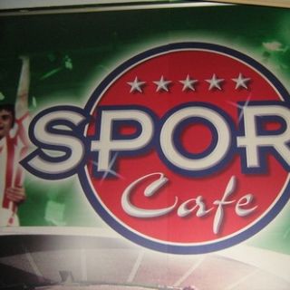 Sport Cafe - logo na zidu